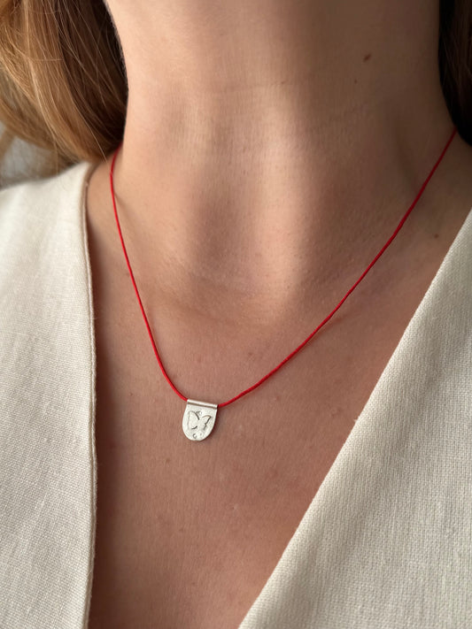 Papillon red cord necklace