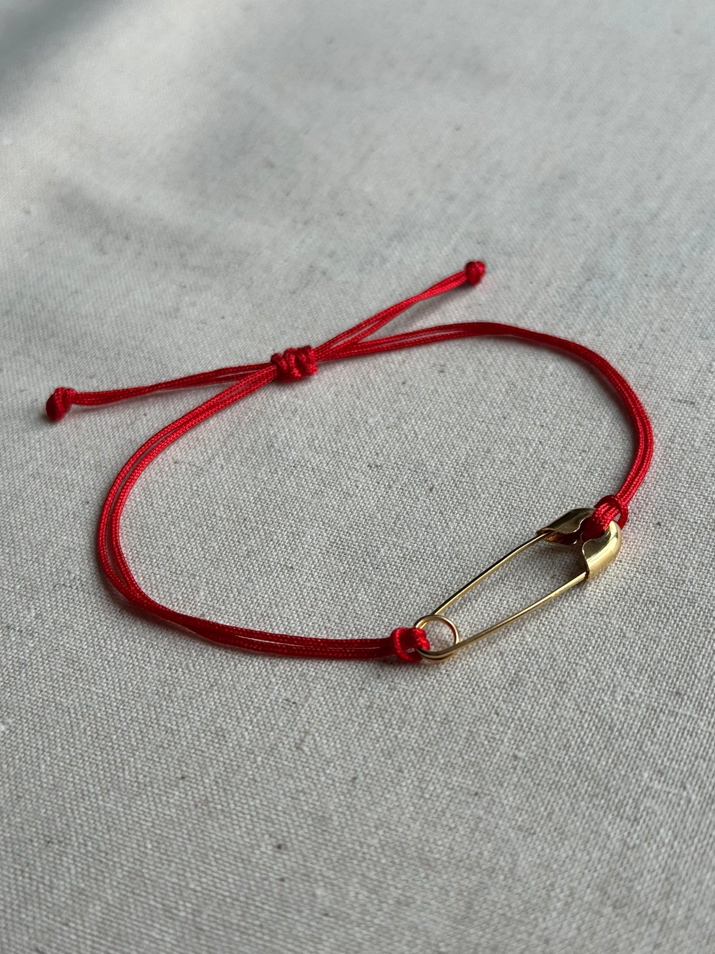 Safety pin red string bracelet