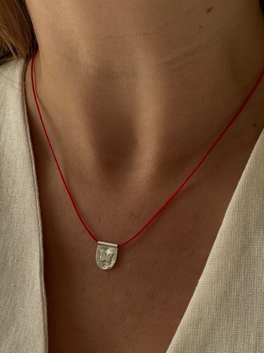 Papillon red cord necklace