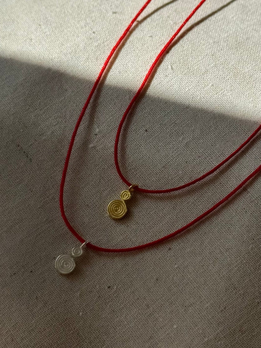 Spiral red cord necklace