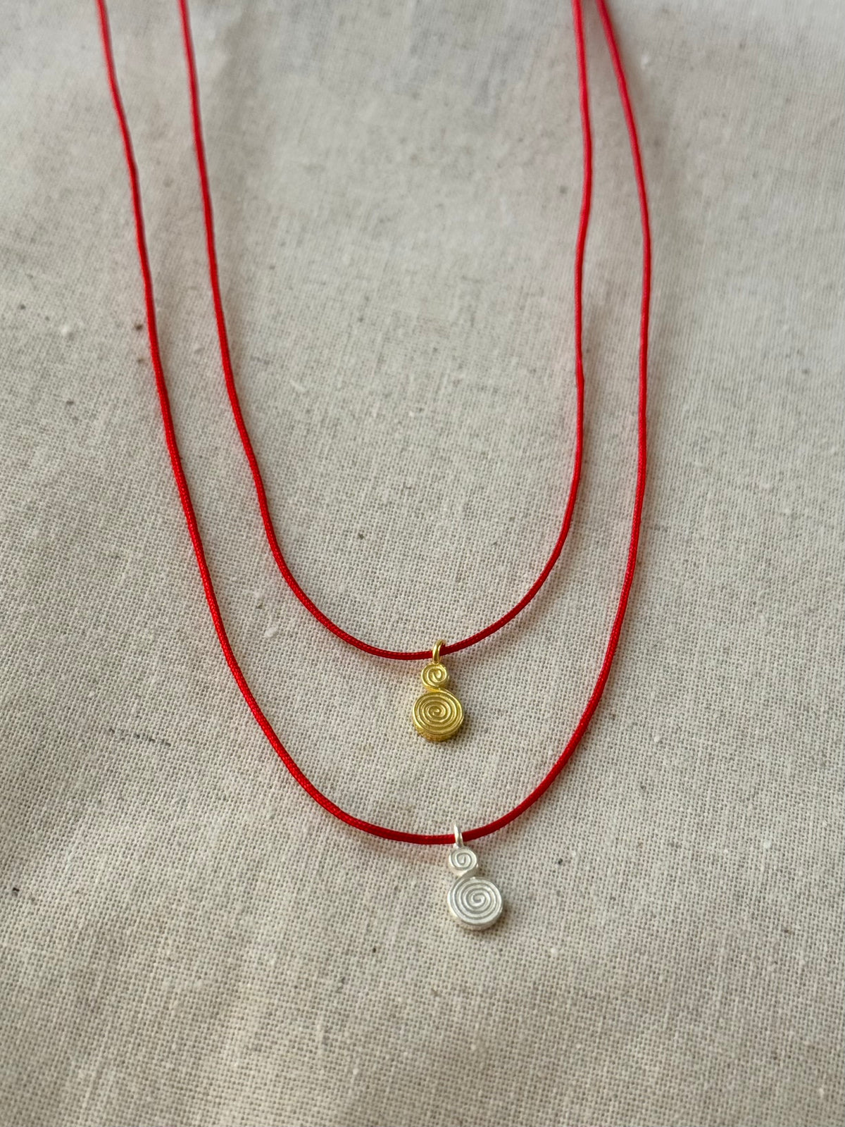 Spiral red cord necklace