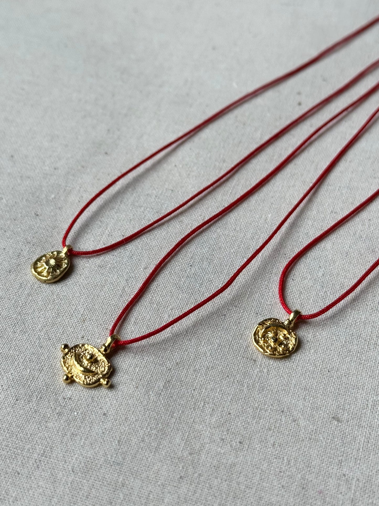 Sun, Eye & Moon Red String Necklace
