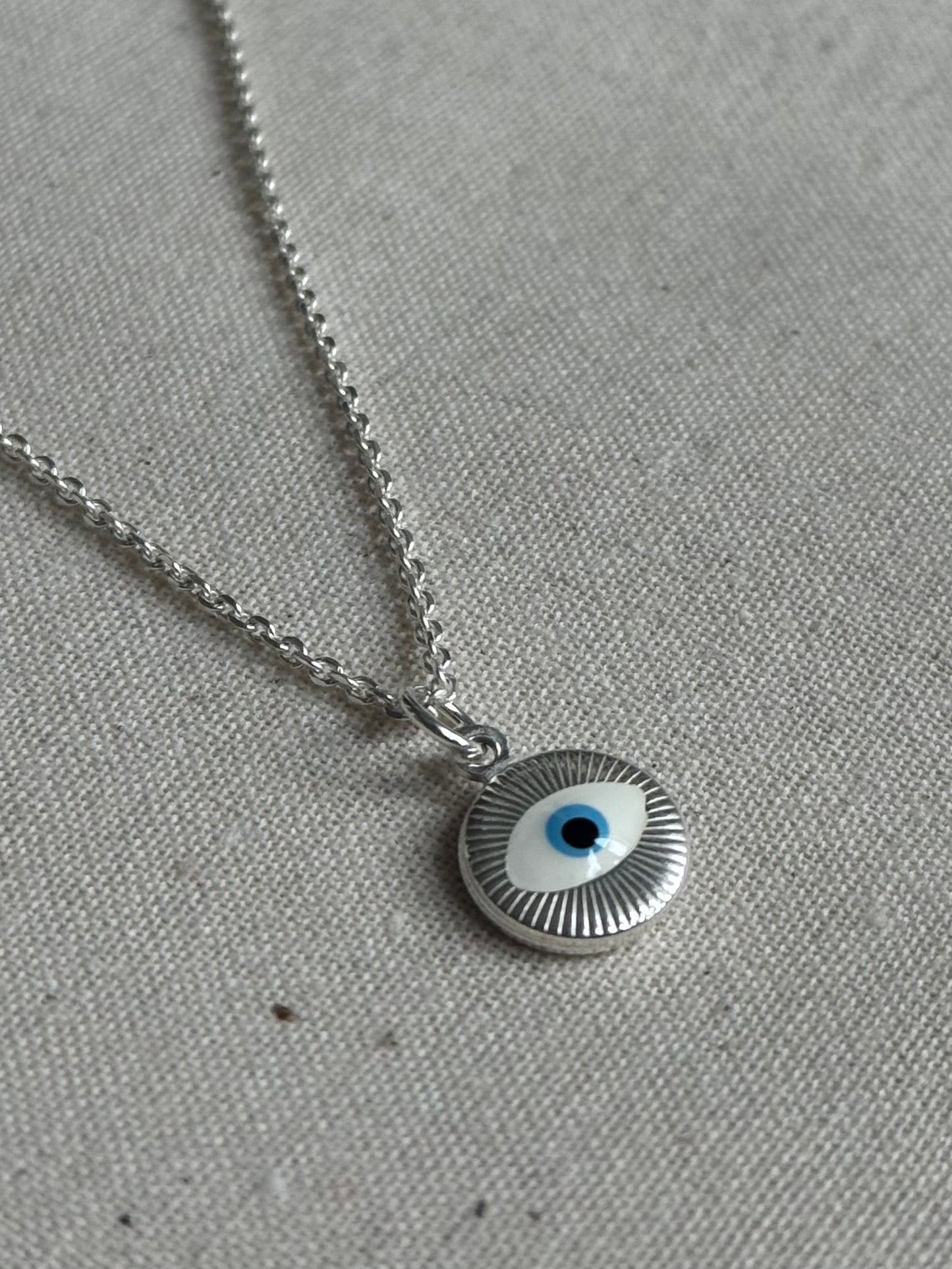 Sterling silver evil eye medallion