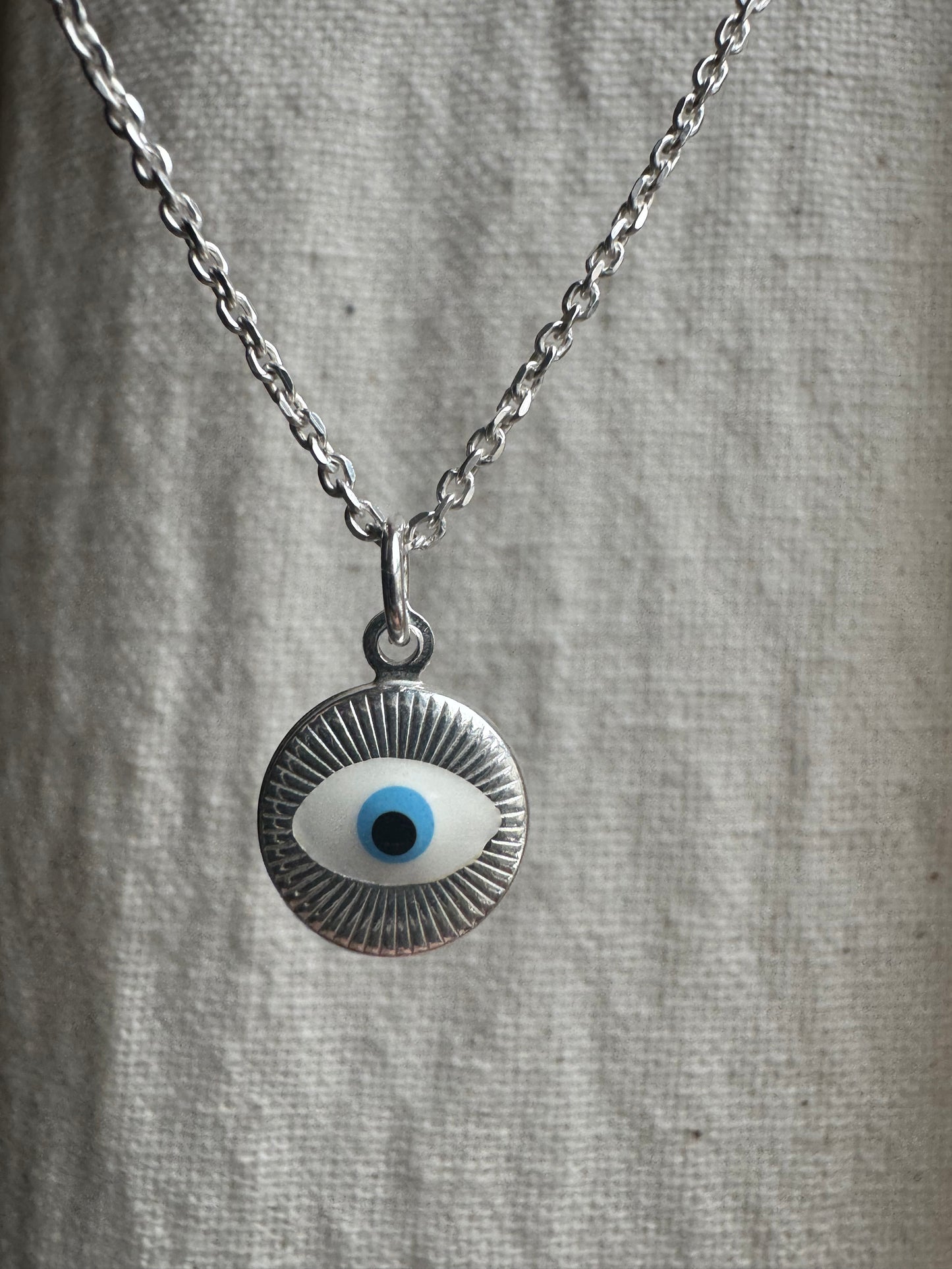 Sterling silver evil eye medallion