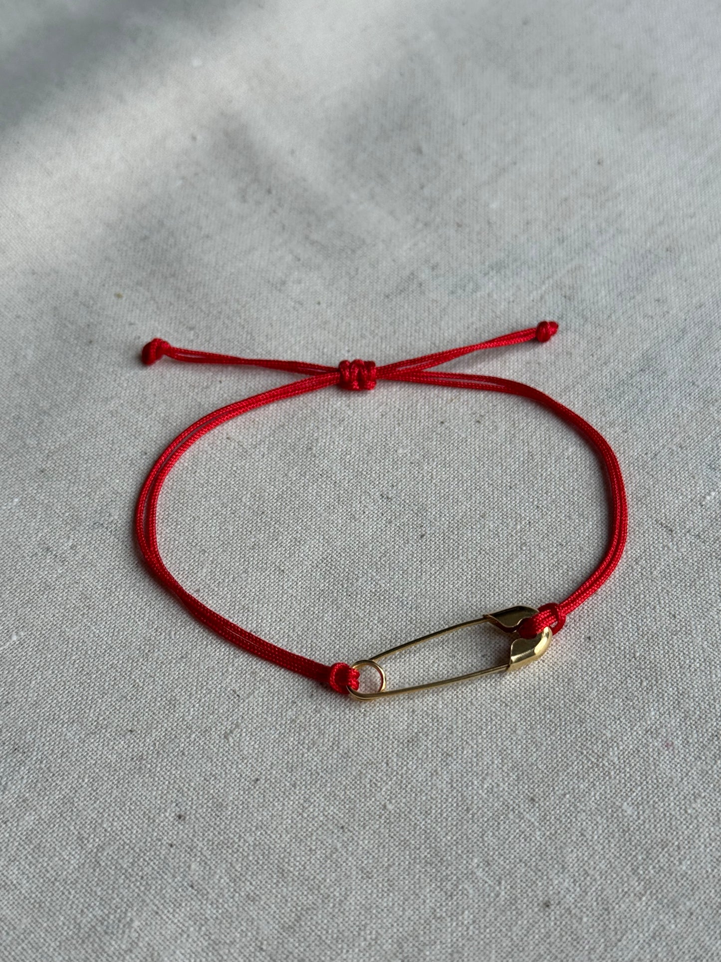 Safety pin red string bracelet