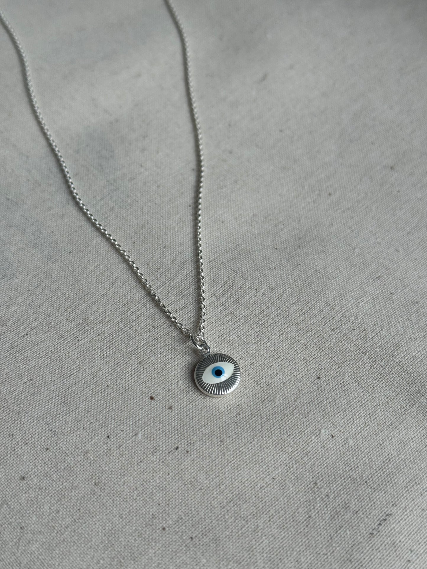 Sterling silver evil eye medallion