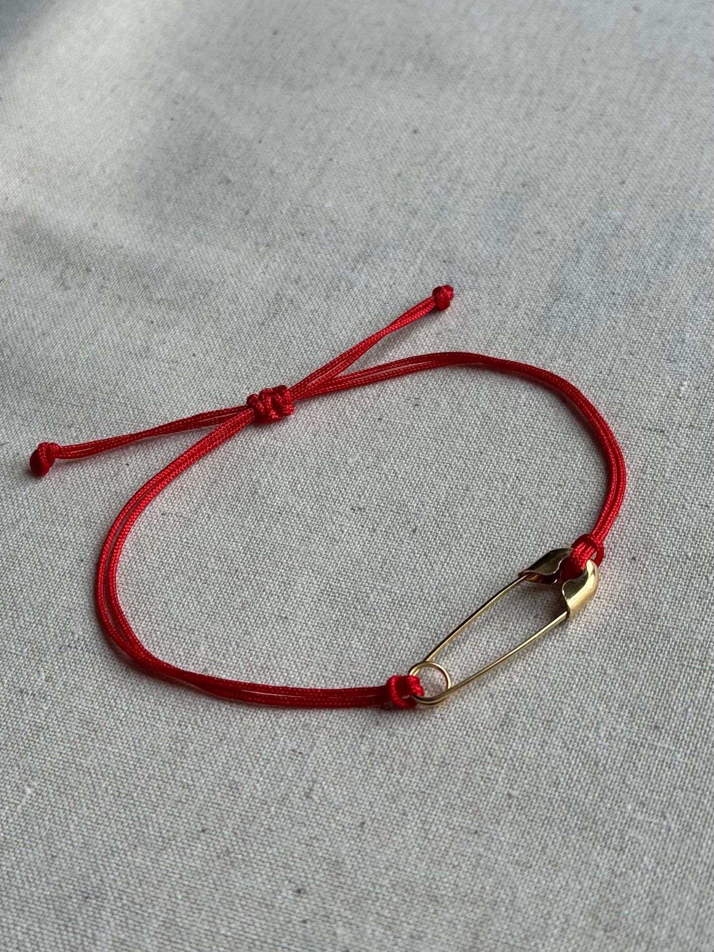Safety pin red string bracelet