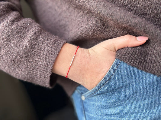 Red string tube bracelet