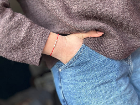 Red string tube bracelet